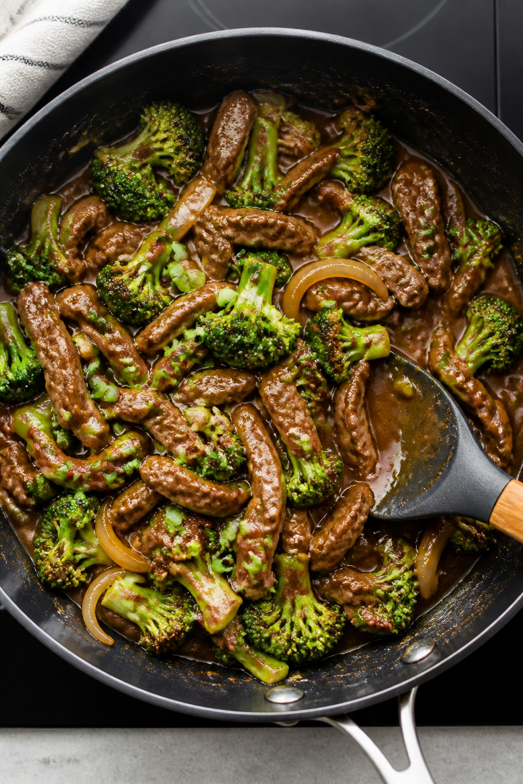 Cooking process: Overhead shot of the beef and broccoli skillet right after “sauce it up,” showi