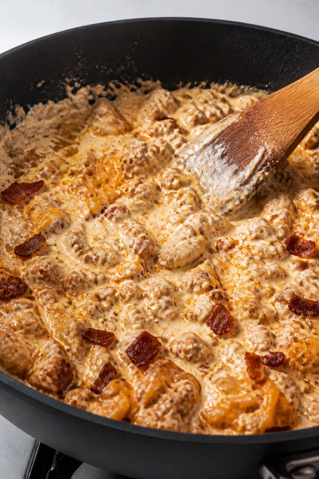 Cooking process: Ground chicken mixture in a large skillet during the “make the creamy base” ste